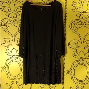 Black evening cocktail dress. Xscape woman 16w.